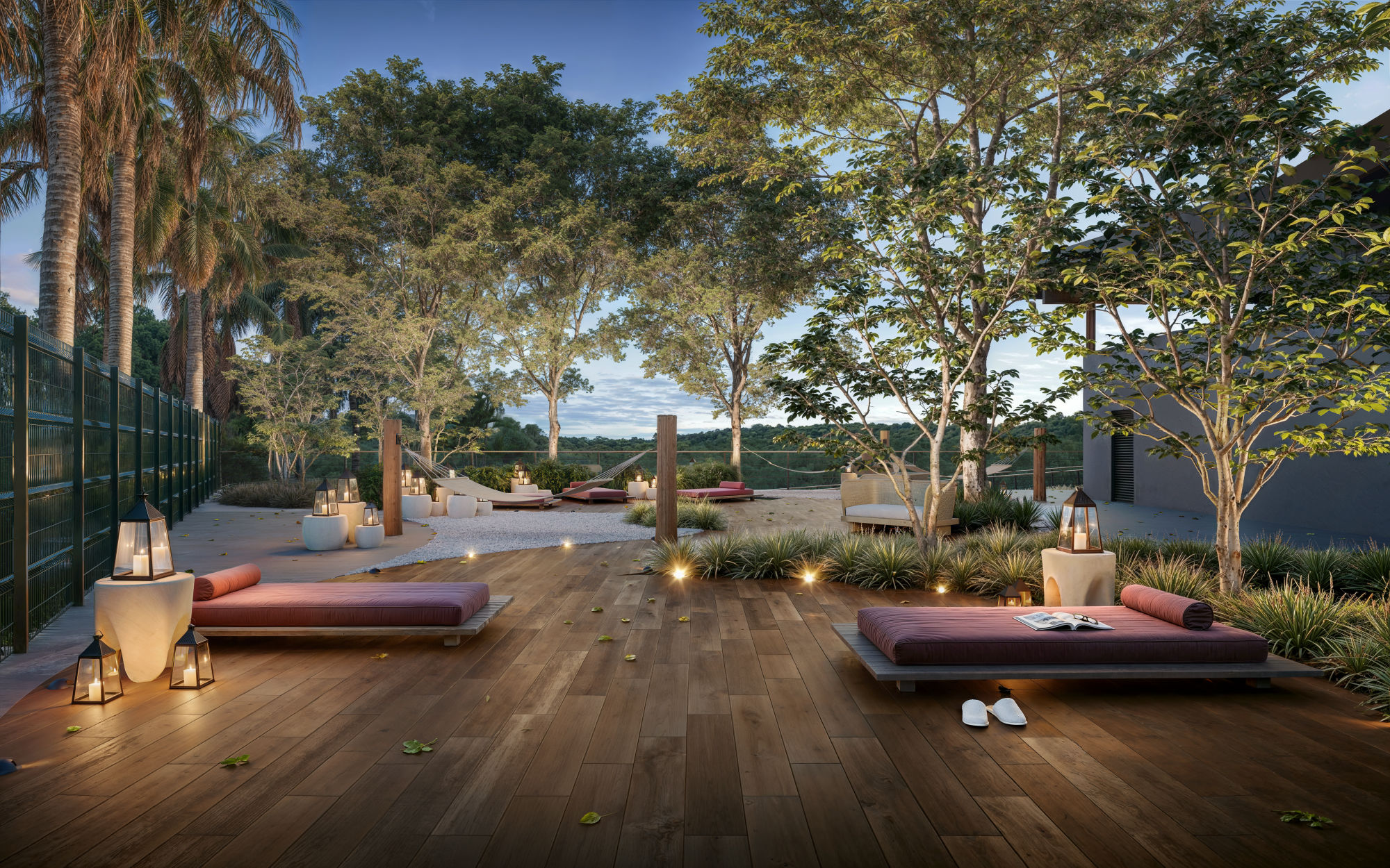 Espaço zen com redário entre as árvores do cerrado.